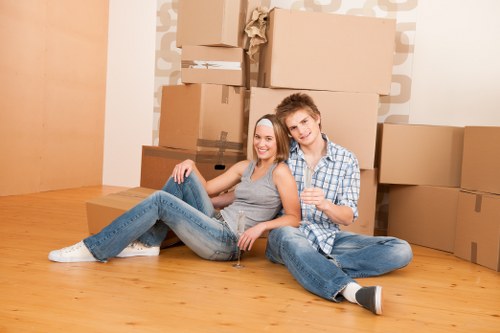 House movers preparing a Brixton home move with boxes and furniture
