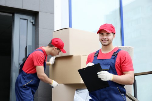 Removal team preparing a Brixton home move on a busy local street