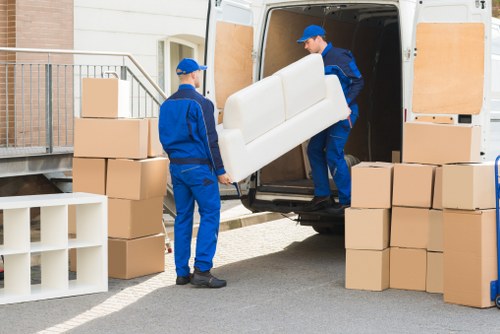 Removal team handling a move in a Brixton street with local access considerations