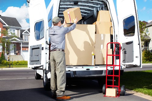 Loading furniture and boxes into a removal van in Brixton