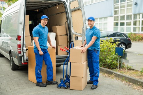 Packed boxes and furniture ready for a Brixton home relocation