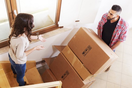 Staircase access in a Brixton flat move with careful handling